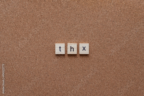 thank you wooden letters on cork board