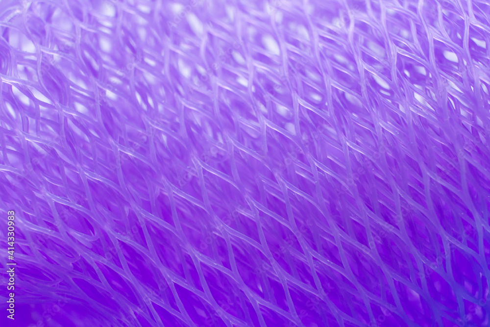 Abstract violet background. Purple texture. Polymer mesh. Macro. Abstract violet background. Purple texture. Polymer mesh. Macro.