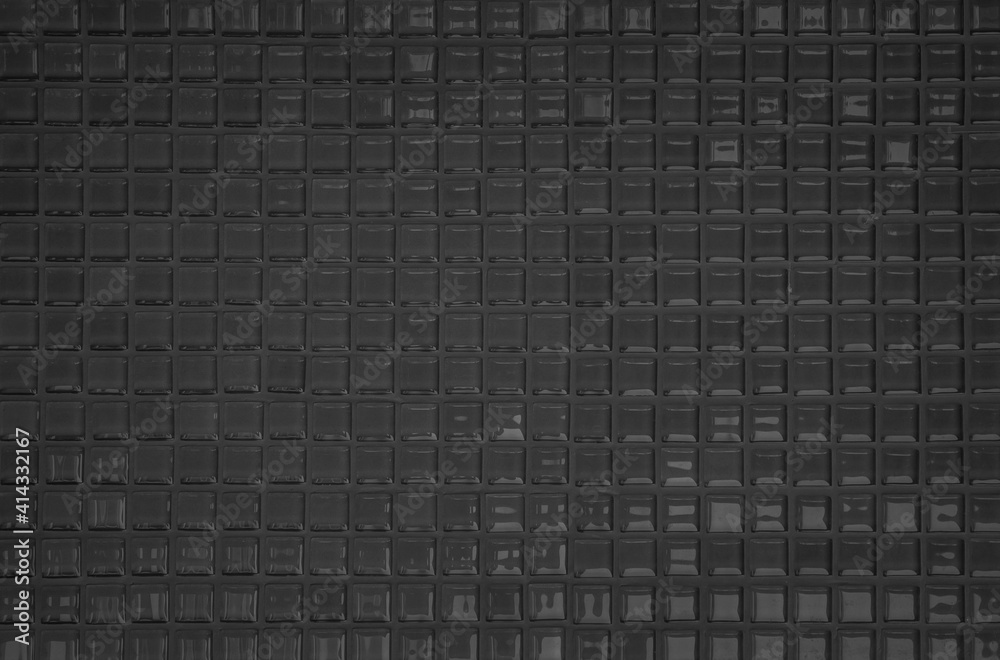 Black tile wall high resolution real photo or brick seamless pattern and texture interior room background. Dark grid tiles wall texture for the decoration of the bedroom, Home or office backdrop. Black tile wall high resolution real photo or brick seamless pattern and texture interior room background. Dark grid tiles wall texture for the decoration of the bedroom, Home or office backdrop.