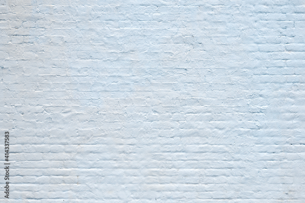 Fototapeta premium light blue plastered brick wall background
