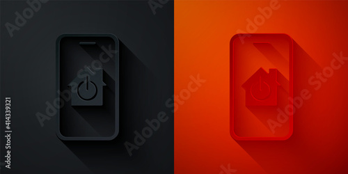 Paper cut Mobile phone with smart home icon isolated on black and red background. Remote control. Paper art style. Vector.