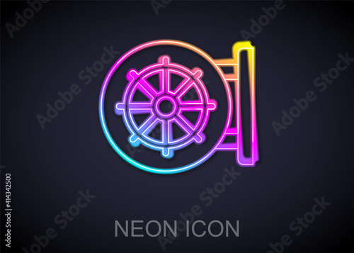 Glowing neon line Dharma wheel icon isolated on black background. Buddhism religion sign. Dharmachakra symbol. Vector.