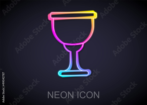 Glowing neon line Holy grail or chalice icon isolated on black background. Christian chalice. Christianity icon. Vector.