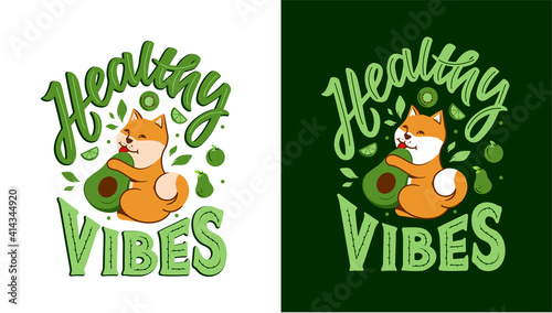 The akita dog with phrase - Healthy vibes. The puppy is eating avocado