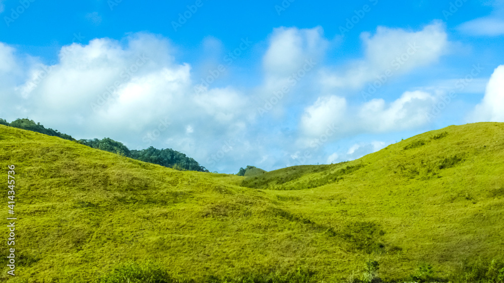 scenery of green karst hill with white cloud ornament on it scenery of green karst hill with white cloud ornament on it