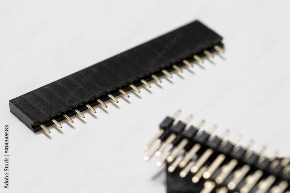 Macro Shot of Separate Straight PCB Connector Placed Against White Background. Macro Shot of Separate Straight PCB Connector Placed Against White Background.