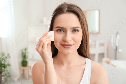 Beautiful young woman with ...