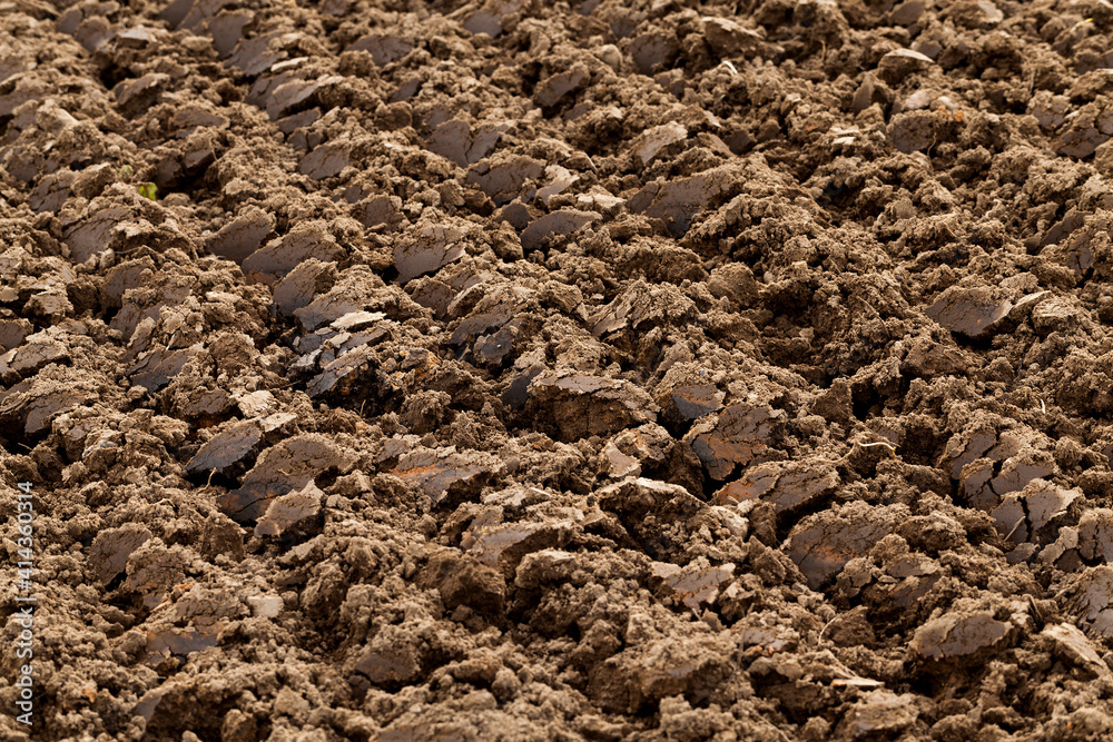 plowed agricultural field plowed agricultural field