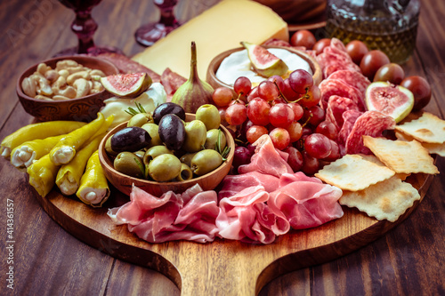 Bild auf Leinwand Charcuterie, antipasti platter with assortment of italian salami, cheese, camemb