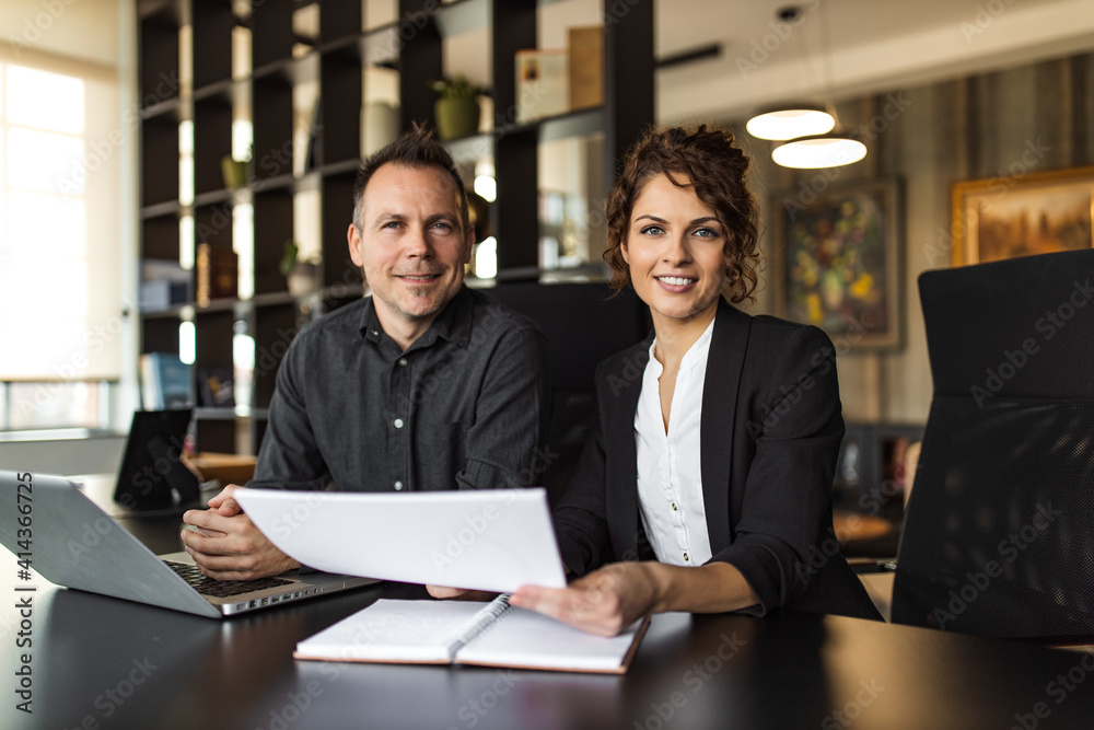 Portrait of a two cheerful HR managers at work. Portrait of a two cheerful HR managers at work.