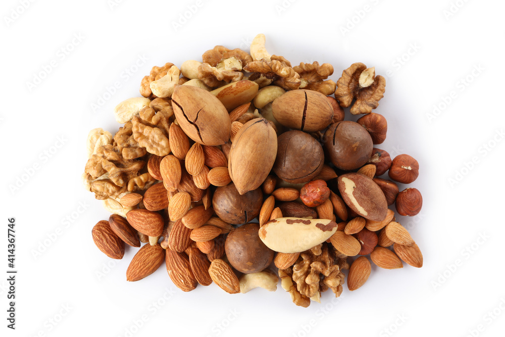 Heap of different tasty nuts isolated on white background Heap of different tasty nuts isolated on white background