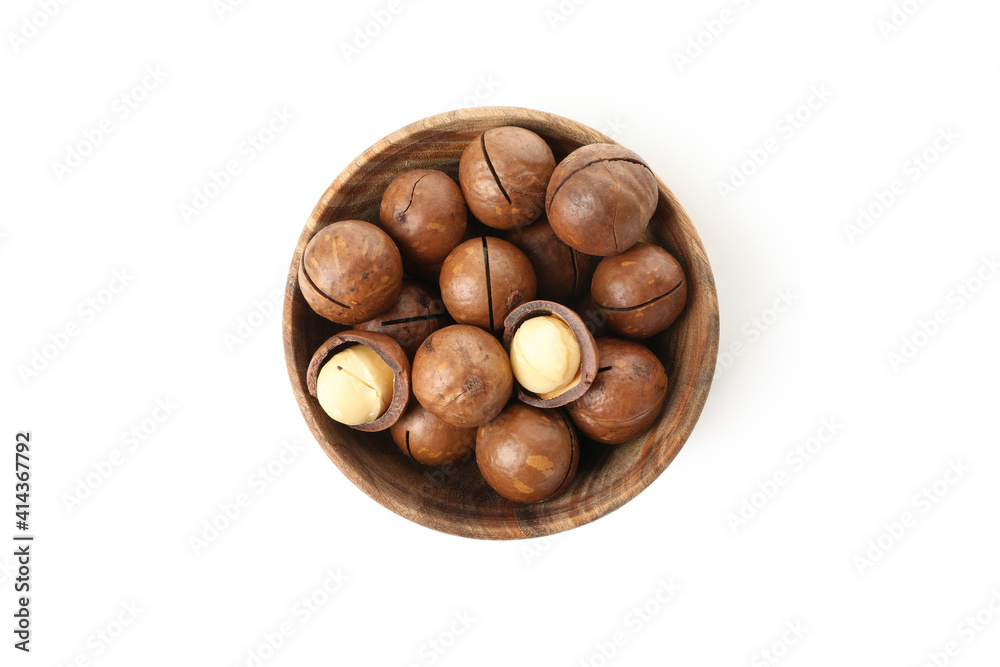 Bowl with macadamia nuts isolated on white background Bowl with macadamia nuts isolated on white background