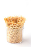 Group of Toothpick in container isolated on white background,  Toothpick is a piece of wooden, small, short stick and peaked, It's device for removing food particles or dirt between teeth. Tableware.