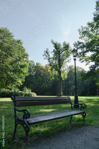 Bench with a lantern in the park 