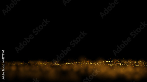 Gold particle dust on black.  Abstract luxury background with glowing yellow light effect. Defocused golden glitter textrure.
