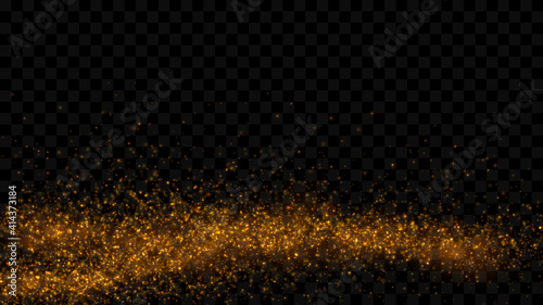 Gold particle dust isolated on dark transparent background. Defocused glitter light texture.