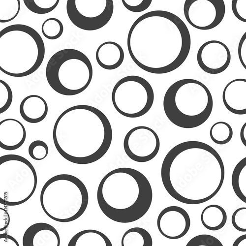 Seamless pattern with rings. Black circles on a white background. Trendy geometric design.