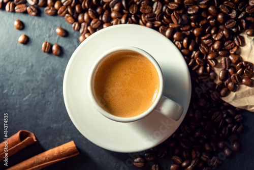 Espresso coffee With coffee beans in the morning background.