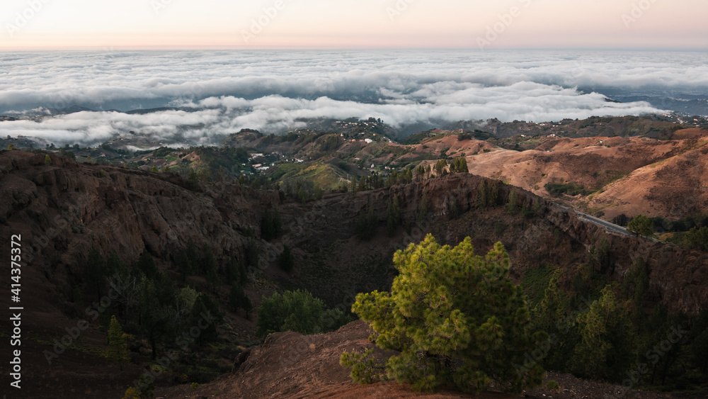 .Incredible views of a landscape from the top of gran canaria with an incredible sunset over a great sea of clouds .Incredible views of a landscape from the top of gran canaria with an incredible sunset over a great sea of clouds
