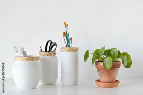White jar craft made with pilea plant