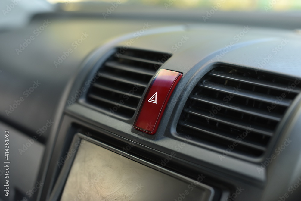Closeup emergency stop button in car