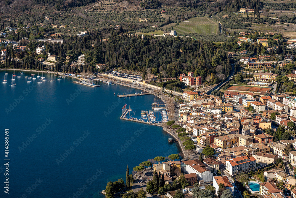Aerial View of the Small Garda Town, tourist resort on the coast of Lake Garda, view from the Rocca di Garda, small hill overlooking the lake. Verona province, Veneto, Italy, Europe.