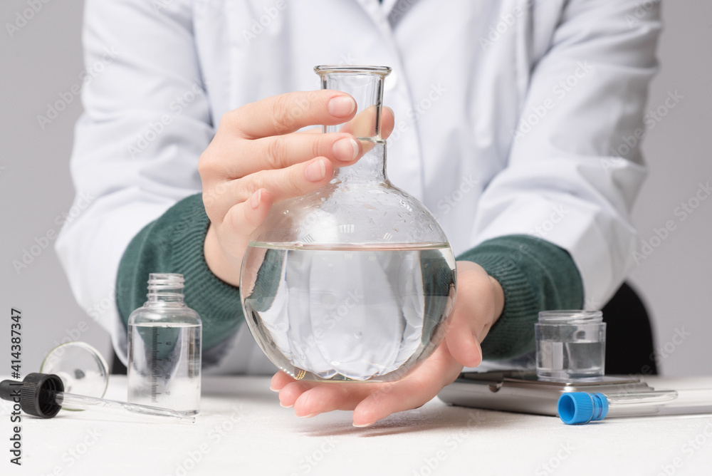Scientist is analysing and testing a water concept. Scientist is analysing and testing a water concept.