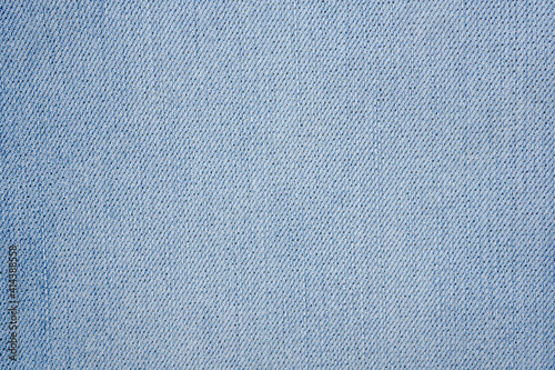 Denim blue jeans fabric. Denim background texture for design. Canvas denim. Blue jeans texture for any background.