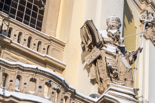 LVIV, UKRAINE - FEBRUARY 12, 2021:  St. George's Cathedral, one of the most important churches in Ukraine. Exterior. St. Leo and St. Athanasius sculptures of the St. George`s Cathedral photo