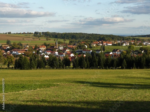 Blick auf Waldbrunn im Odenwald mit Häusern und Landschaften photo