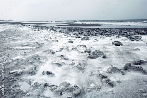 Winter in Holland with ice along the coast