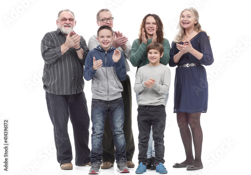 in full growth. happy family applauding together.