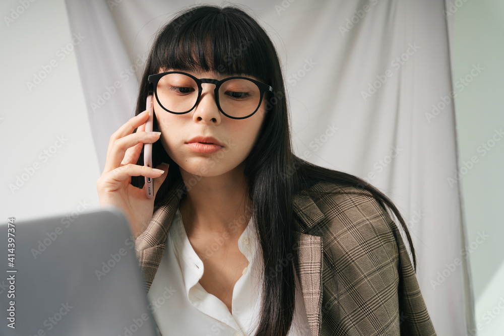 Business asian thai long dark hair woman wearing eyeglasses using laptop. Business asian thai long dark hair woman wearing eyeglasses using laptop.