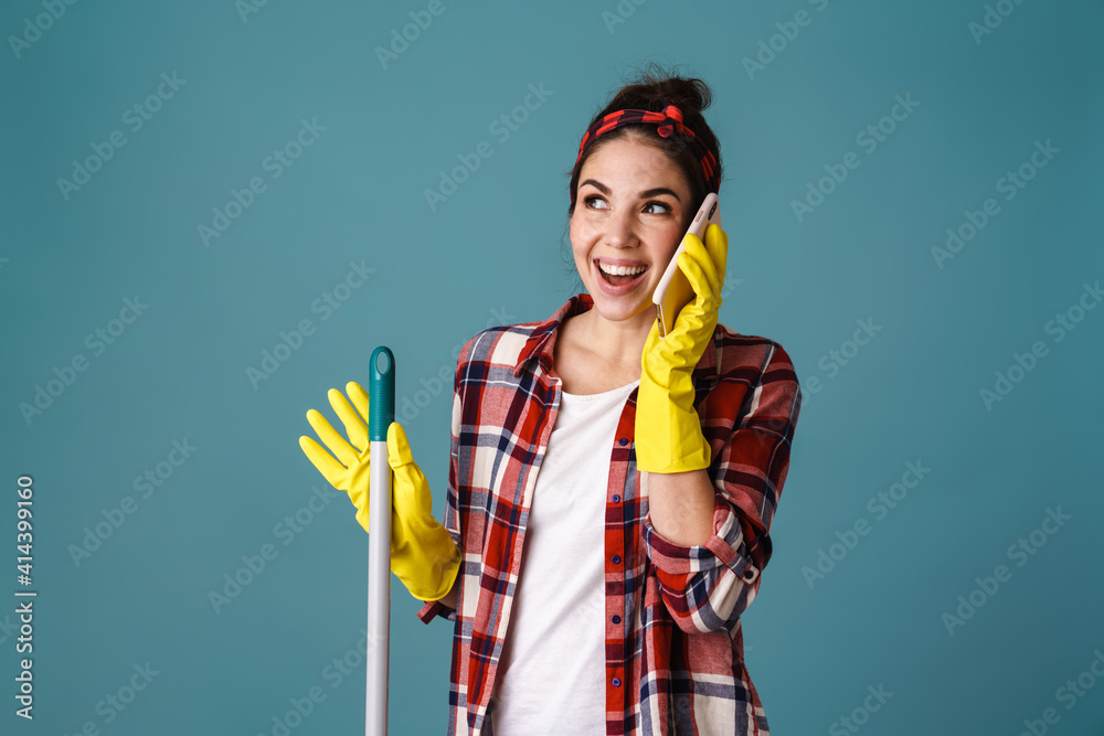 Excited attractive woman in rubber gloves and apron Excited attractive woman in rubber gloves and apron