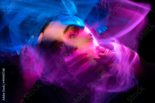 lightpainting portrait, new art direction, long exposure photo without photoshop, light drawing at long exposure. abstract portrait 