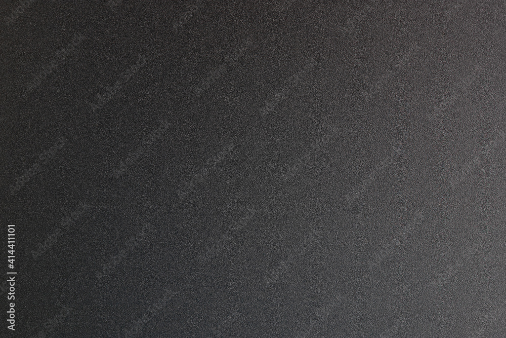 textured metal surface in dark gray color, background