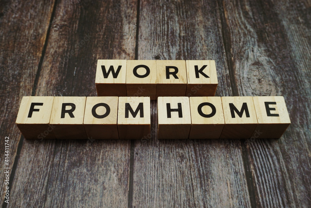 Work from Home alphabet letter on wooden background Work from Home alphabet letter on wooden background