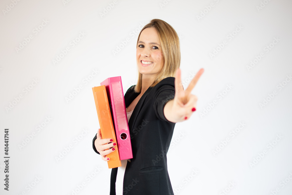 Young business woman holding file cabinets over white background. Young business woman holding file cabinets over white background.