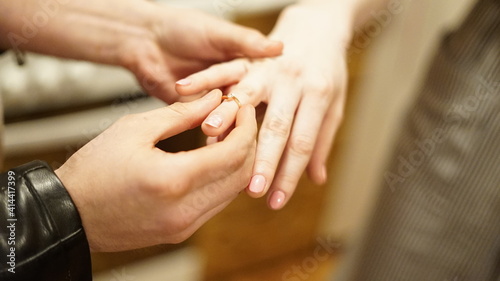 hands of the groom and bride