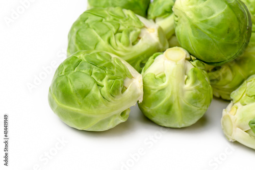 Green fresh brussels sprouts on the white background