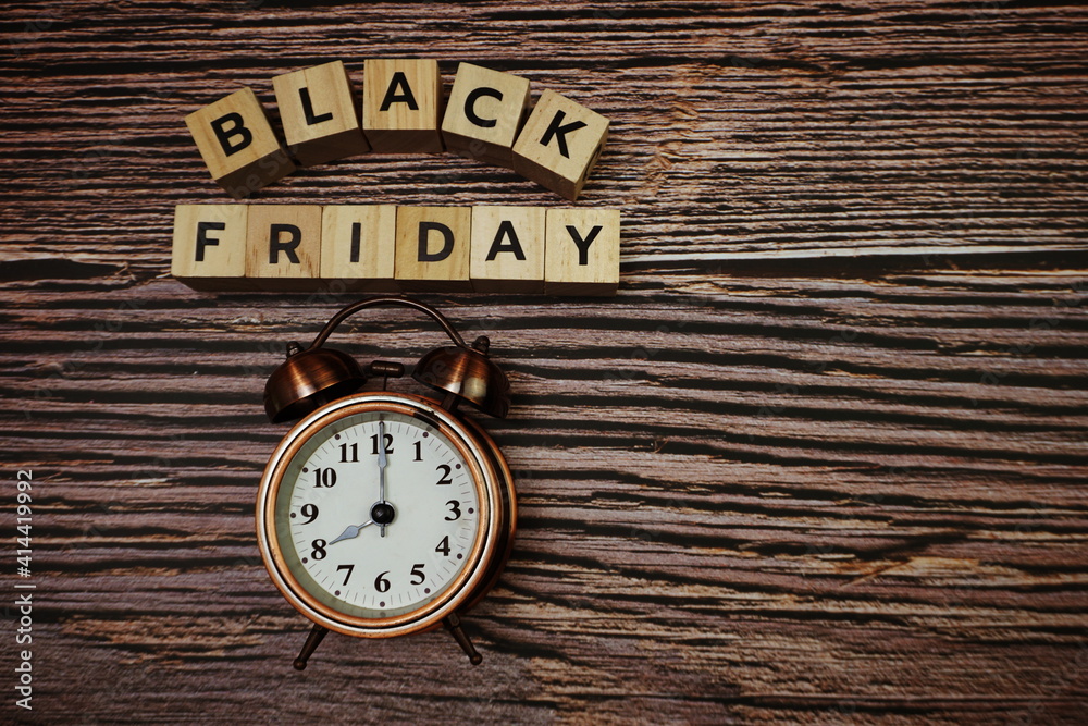Black Friday message alphabet letter on wooden background Black Friday message alphabet letter on wooden background