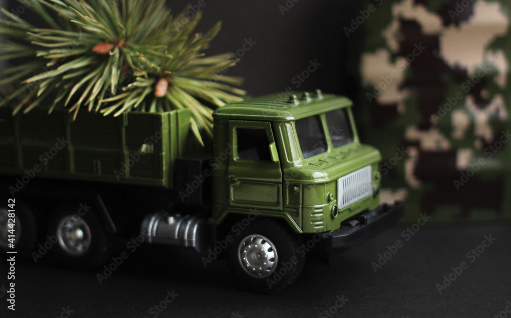 Toy military car for February 23 Men's Holiday