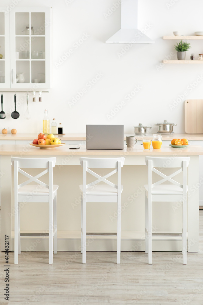 Home office in kitchen, vitamins during covid-19 lockdown Home office in kitchen, vitamins during covid-19 lockdown