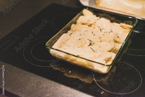 Oven dish with potatoes and sauc photo