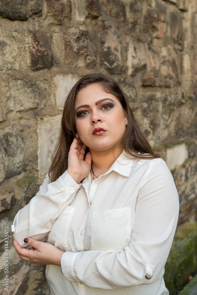 Portrait of Portuguese woman with hand in hair