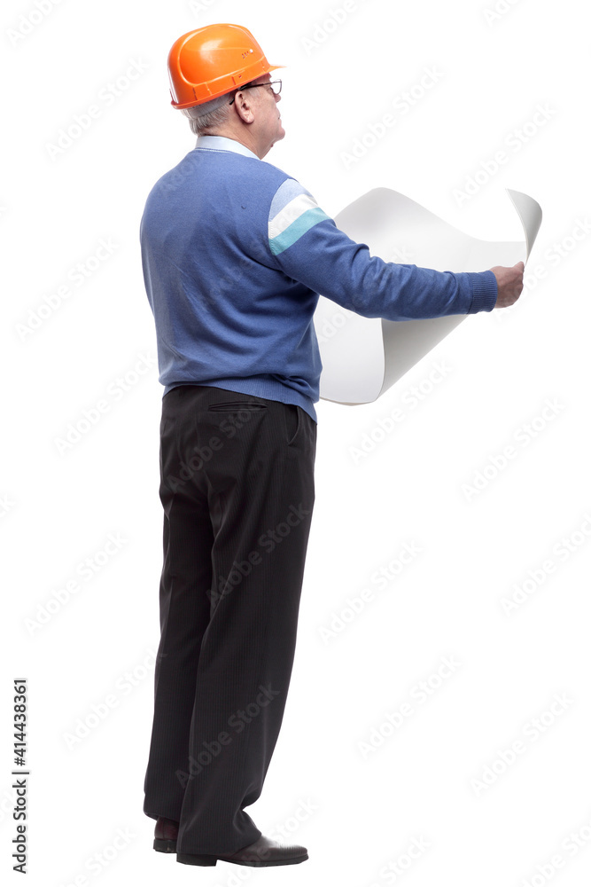 side view. an experienced senior engineer when reading the drawings side view. an experienced senior engineer when reading the drawings