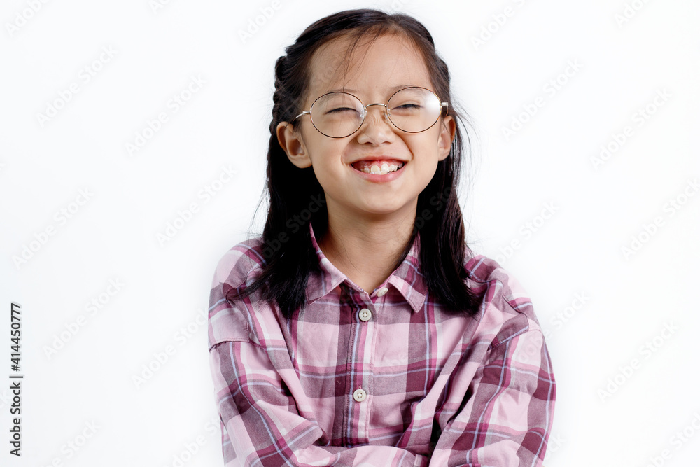Portrait of happy little Asian girl wearing casual and glasses isolated on white background. Portrait of happy little Asian girl wearing casual and glasses isolated on white background.