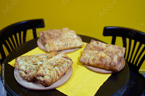 Freshly baked homemade savory puff pastries patties, rollini photo