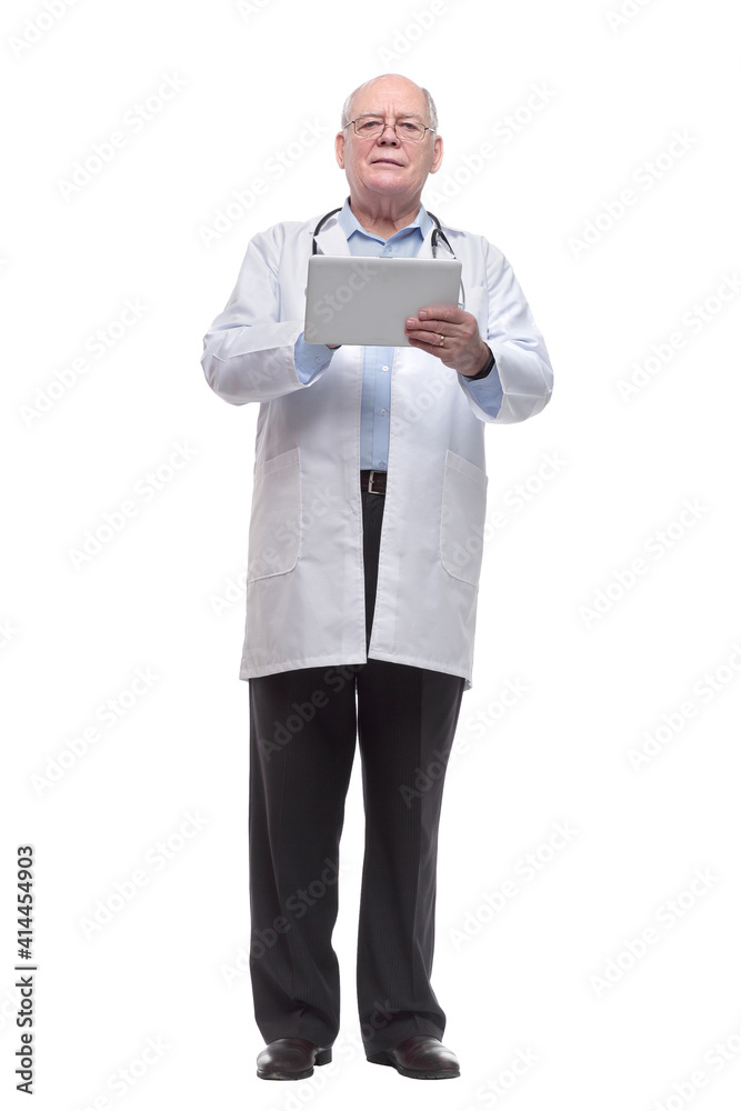 in full growth. senior doctor with a digital tablet in full growth. senior doctor with a digital tablet