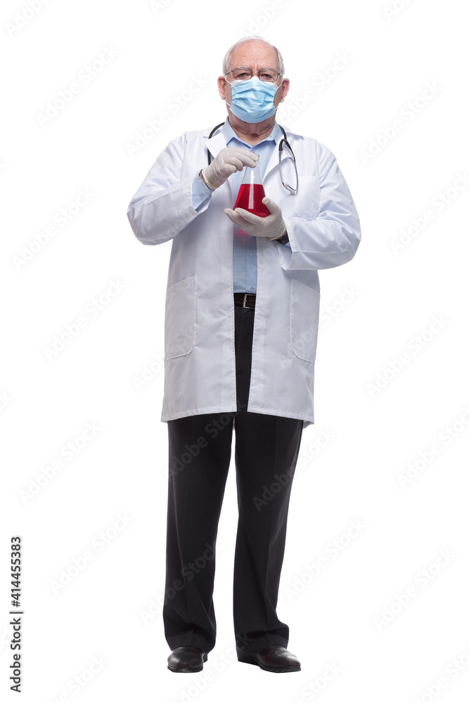doctor in a protective mask holds a laboratory flask doctor in a protective mask holds a laboratory flask